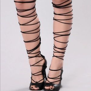 Black strapped heeled shoes